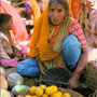 Sidewalk fruit vendor